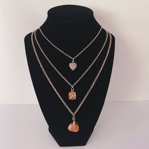 Three necklaces with pendant all sold separately